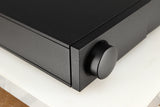 Front left corner of a used Naim NAC112 Pre Amplifier in a black finish