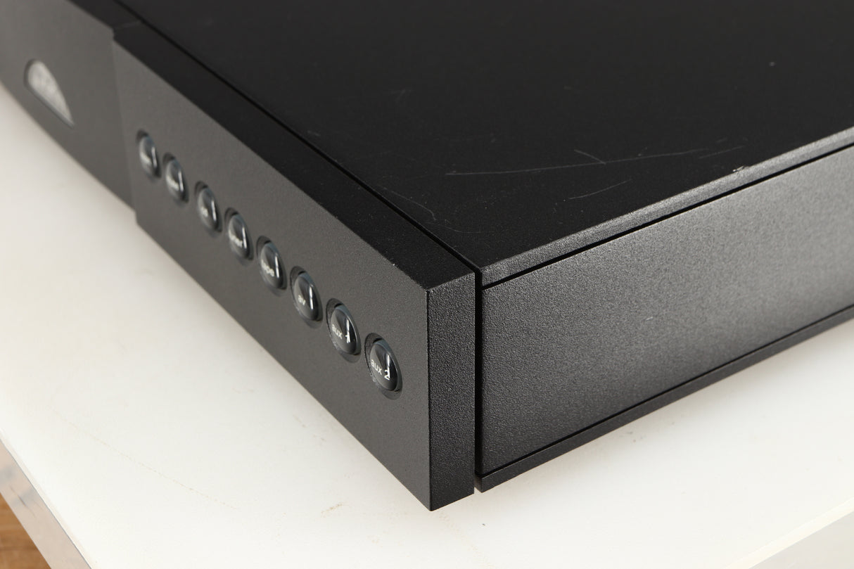 Front right corner of a used Naim NAC112 Pre Amplifier in a black finish