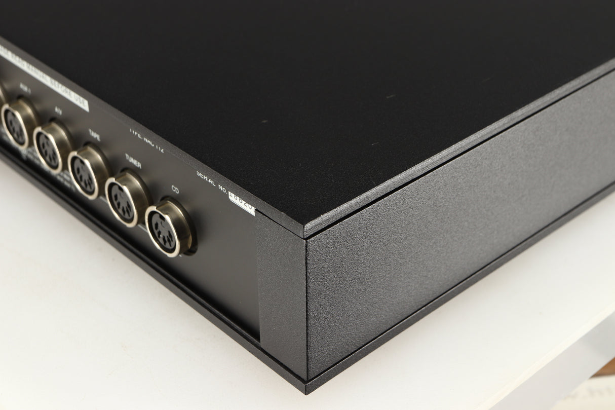 Rear left corner of a used Naim NAC112 Pre Amplifier in a black finish