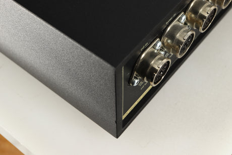 Close up of a used Naim NAC252 Pre Amplifier in a black finish showing small chip on rear right corner