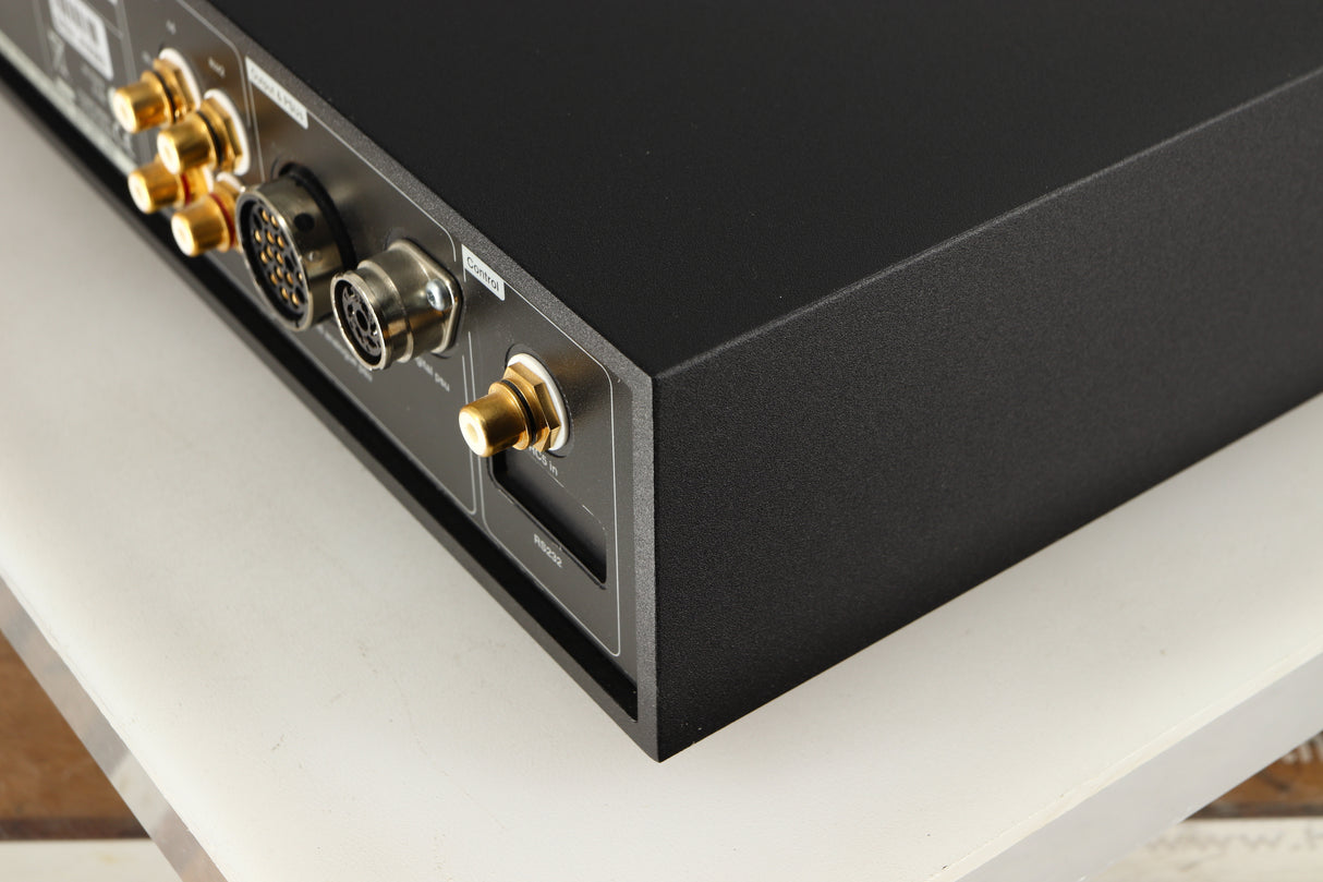 Rear left corner of a used Naim NAC252 Pre Amplifier in a black finish