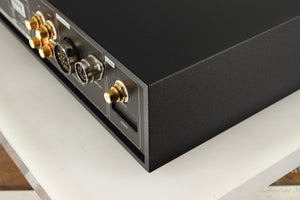 Rear left corner of a used Naim NAC252 Pre Amplifier in a black finish