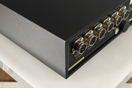Rear right corner of a used Naim NAC252 Pre Amplifier in a black finish