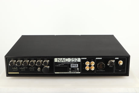 Rear view of a used Naim NAC252 Pre Amplifier in a black finish showing Phono Inputs, DIN Inputs, Din Outputs and Analogue Output