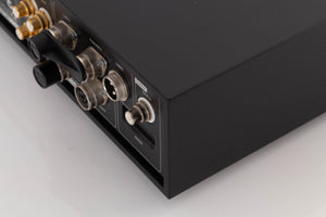 Rear left corner of a used Naim NAC282 Pre Amplifier in a Black finish