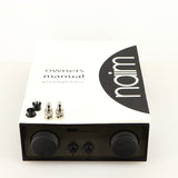 Top of a used Naim NAC72 Pre Amplifier in a black finish showing Manual and 2x BNC Connectors
