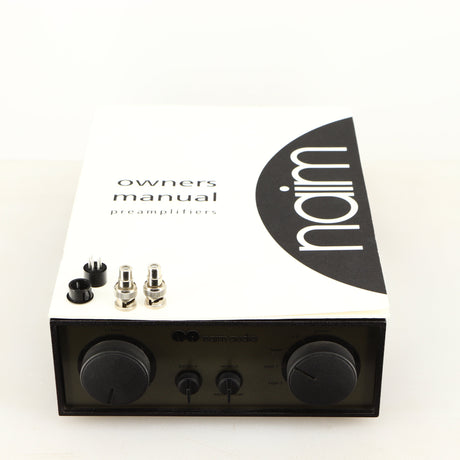 Top of a used Naim NAC72 Pre Amplifier in a black finish showing Manual and 2x BNC Connectors