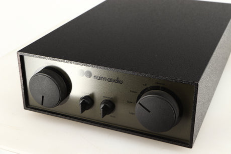 Close up of a used Naim NAC72 Pre Amplifier in a black finish showing fascia