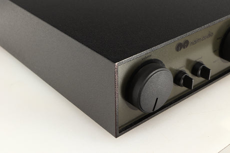 Front left corner of a used Naim NAC72 Pre Amplifier in a black finish
