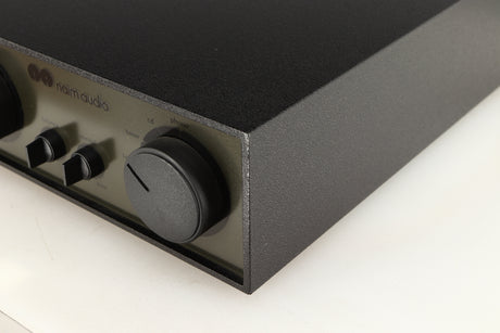 Front right corner of a used Naim NAC72 Pre Amplifier in a black finish