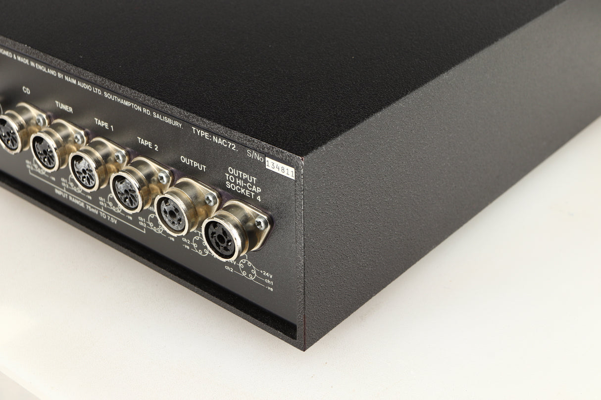 Rear left corner of a used Naim NAC72 Pre Amplifier in a black finish