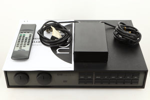 View of a used Naim NAC82 Pre Amplifier and NAPSC Power Supply showing Remote