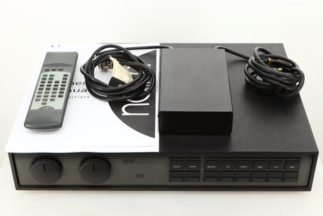 View of a used Naim NAC82 Pre Amplifier and NAPSC Power Supply showing Remote