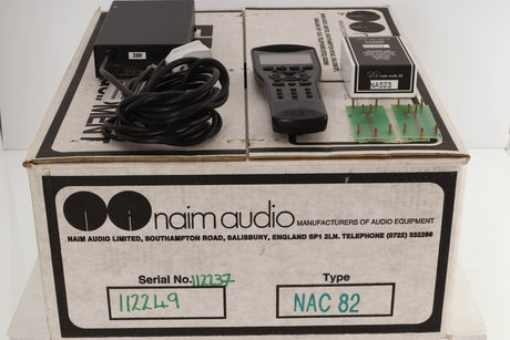Box of a used Naim NAC82 Pre Amplifier with NAPSC Power Supply with remote, NA523/1 Phono Boards fitted, and POTS5