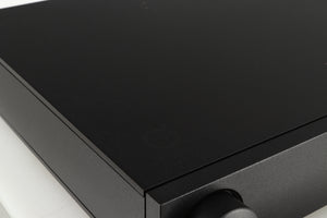 Close up of a used Naim NAIT 5 Integrated Amplifier in a black finish showing a foot mark