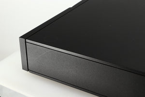 Close up of a used Naim NAIT 5 Integrated Amplifier in a black finish showing some scratching