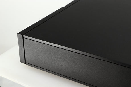 Close up of a used Naim NAIT 5 Integrated Amplifier in a black finish showing some scratching