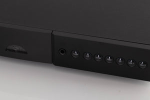 Close up of a used Naim Nait XS-2 Integrated Amplifier in a Black finish showing very light marks on fascia