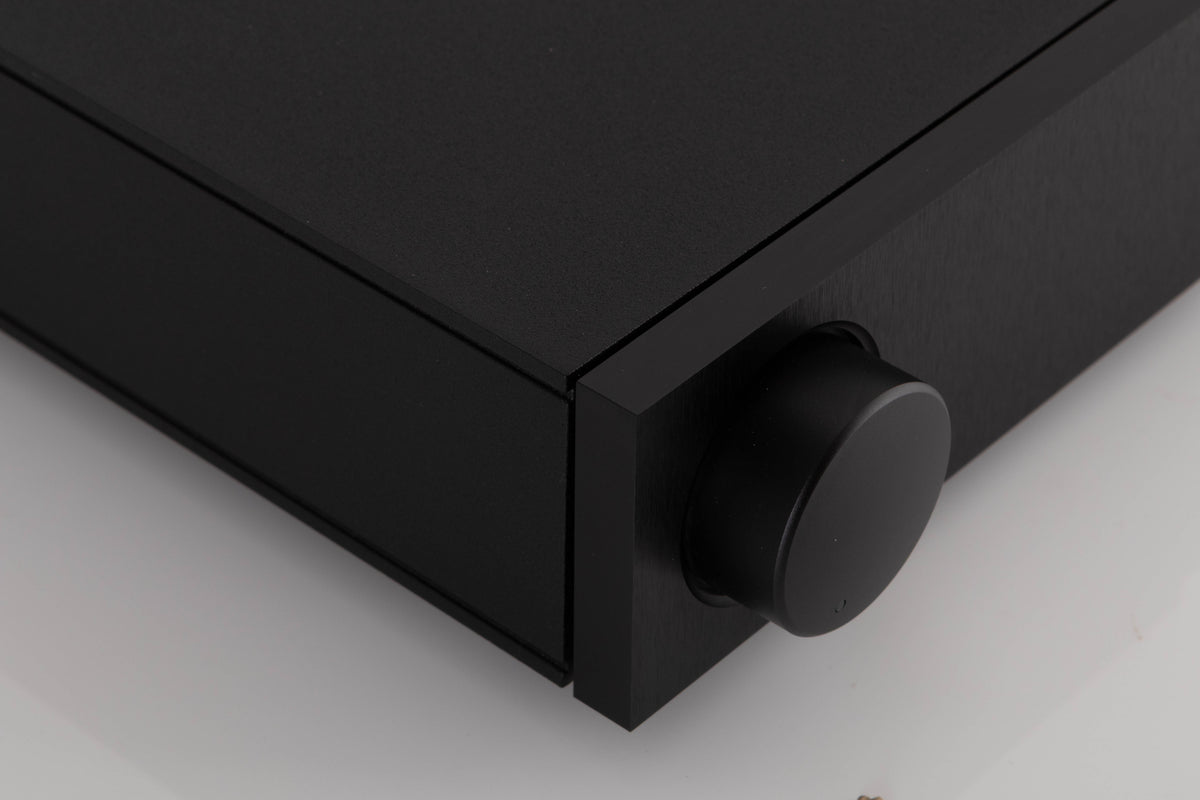 Front left corner of a used Naim Nait XS-2 Integrated Amplifier in a Black finish