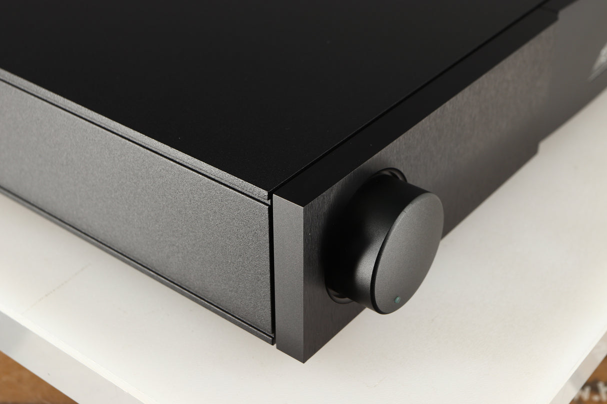 Front left corner of a used Naim Nait XS-2 Integrated Amplifier in a black finish