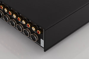 Rear left corner of a used Naim Nait XS-2 Integrated Amplifier in a Black finish