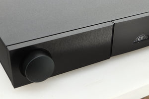 Close up view of a used Naim Nait XS-3 Integrated Amplifier showing the left side of the fascia