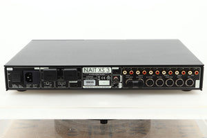 Rear view of a used Naim Nait XS-3 Integrated Amplifier showing Speaker outputs, mains, RCA, and SNAIC inputs