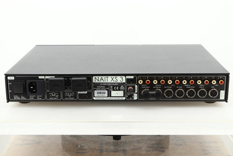 Rear view of a used Naim Nait XS-3 Integrated Amplifier showing Speaker outputs, mains, RCA, and SNAIC inputs