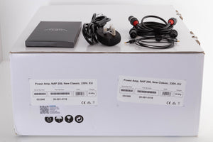 Box of a used Naim NAP 250 Power Amplifier with mains cable, manual, 2x XLR cables, and optical cable