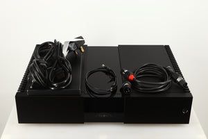 Top of a used Naim NAP 250 Power Amplifier in a black finish showing XLR Cable, Mains Cable, Schuko Cable and Manual