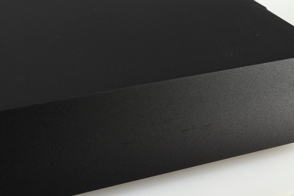 Close up of a used Naim NAP 250 Power Amplifier in a black finish showing scratches on right side