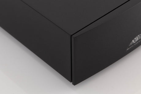 Front left corner of a used Naim NAP100 Power Amplifier in a Black finish