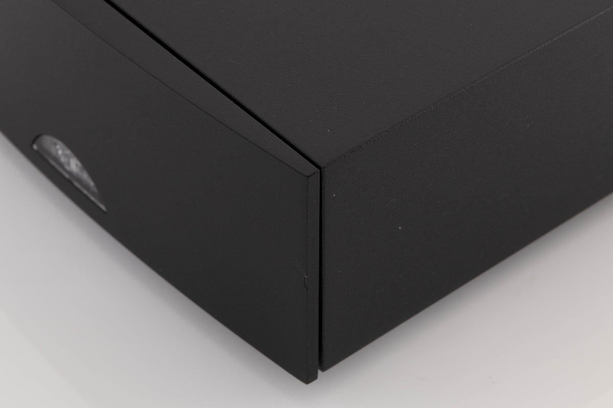Front right corner of a used Naim NAP100 Power Amplifier in a Black finish