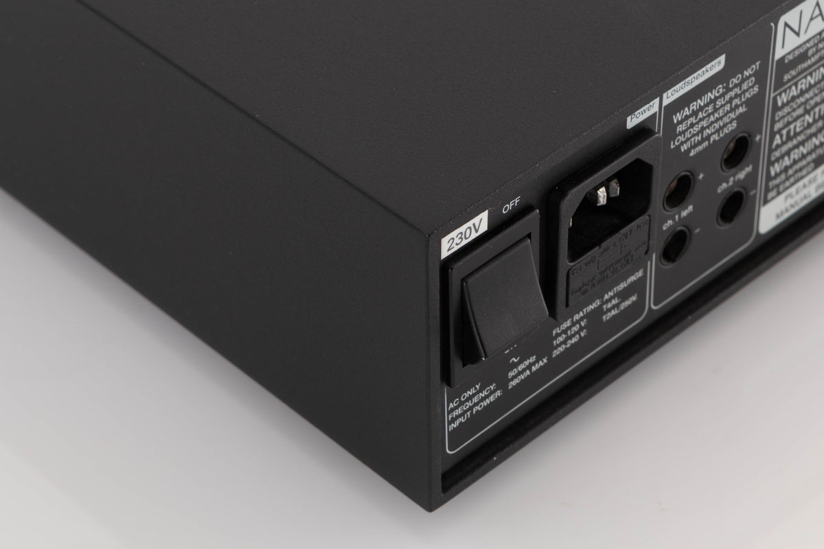 Rear right corner of a used Naim NAP100 Power Amplifier in a Black finish