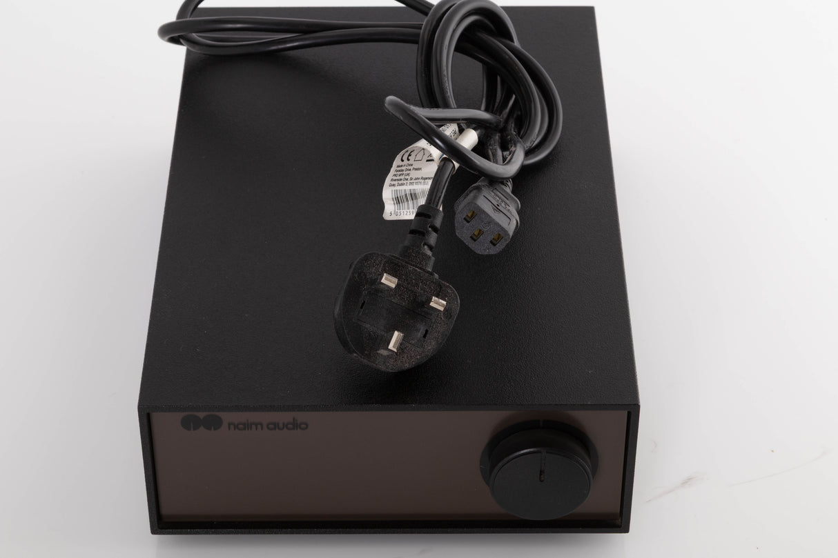 Top of a used Naim NAP140 Power Amplifier in a Black finish showing Mains Cable