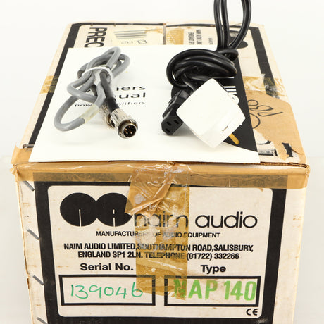 Box for a used Naim NAP140 Power Amplifier in a black finish showing Manual, SNAIC4 and Mains Cable