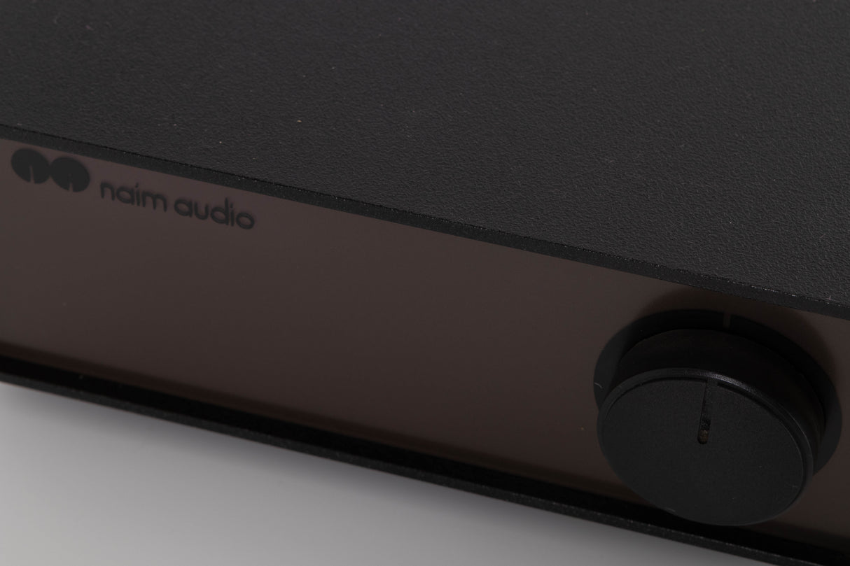 Close up of a used Naim NAP140 Power Amplifier in a Black finish showing fascia
