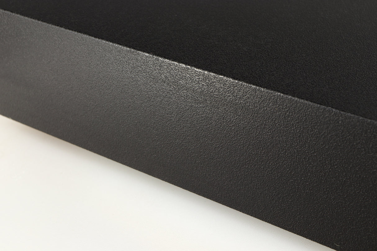 Close up of a used Naim NAP140 Power Amplifier in a black finish showing light marks on right side
