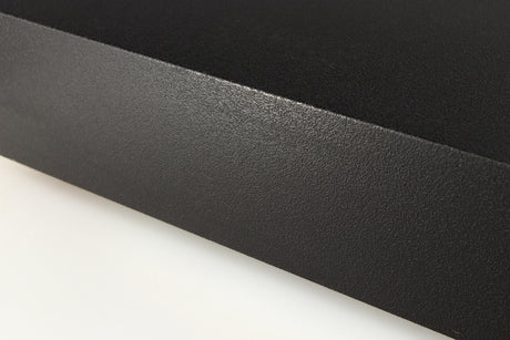 Close up of a used Naim NAP140 Power Amplifier in a black finish showing light marks on right side