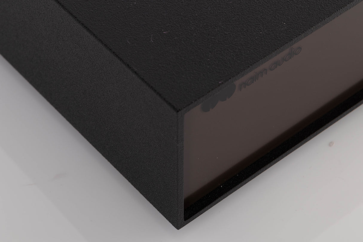 Front left corner of a used Naim NAP140 Power Amplifier in a Black finish