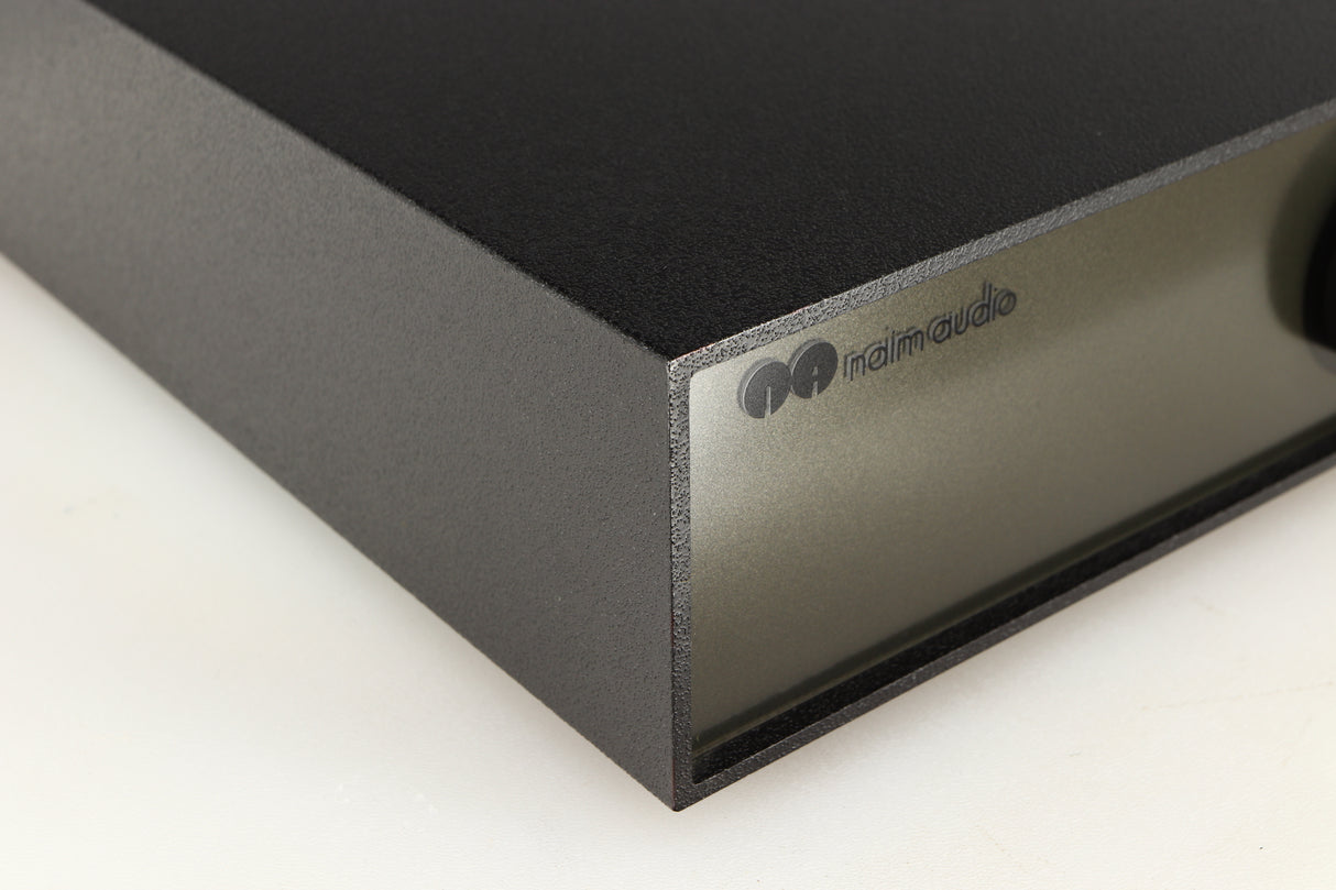 Front left corner of a used Naim NAP140 Power Amplifier in a black finish