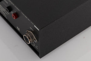 Rear left corner of a used Naim NAP140 Power Amplifier in a Black finish