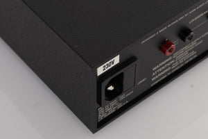 Rear right corner of a used Naim NAP140 Power Amplifier in a Black finish