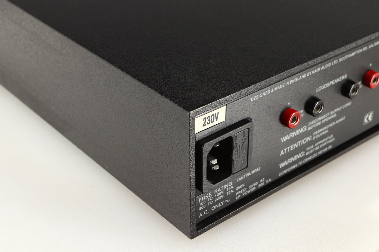 Rear right corner of a used Naim NAP140 Power Amplifier in a black finish