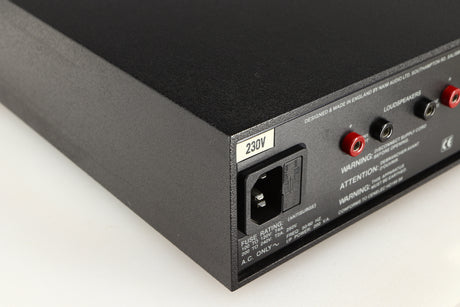 Rear right corner of a used Naim NAP140 Power Amplifier in a black finish