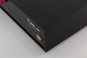 Rear left corner of a used Naim NAP160 Power Amplifier in a Black finish