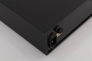 Rear right corner of a used Naim NAP160 Power Amplifier in a Black finish