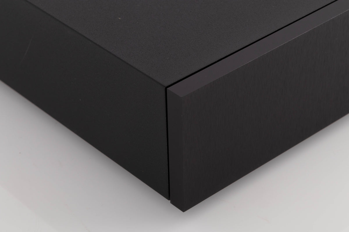 Front left corner of a used Naim NAP250-2 Power Amplifier in a Black finish