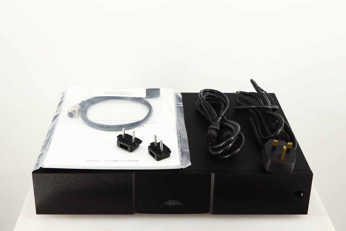 Top of a used Naim NAP250 DR Power Amplifier in a black finish  showing Manual, SNAIC4, 2x Link Plugs, Mains Cable and Schuko Cable