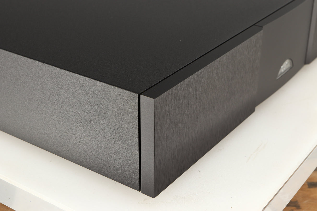 Front left corner of a used Naim NAP250 DR Power Amplifier in a black finish 